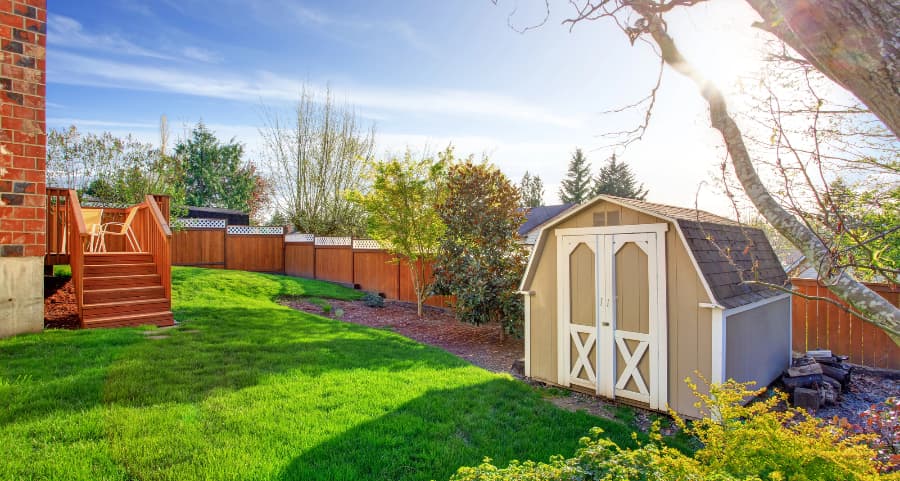 Fenced backyard with storage shed in Chico